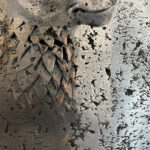 METAL LIONESS ON METAL